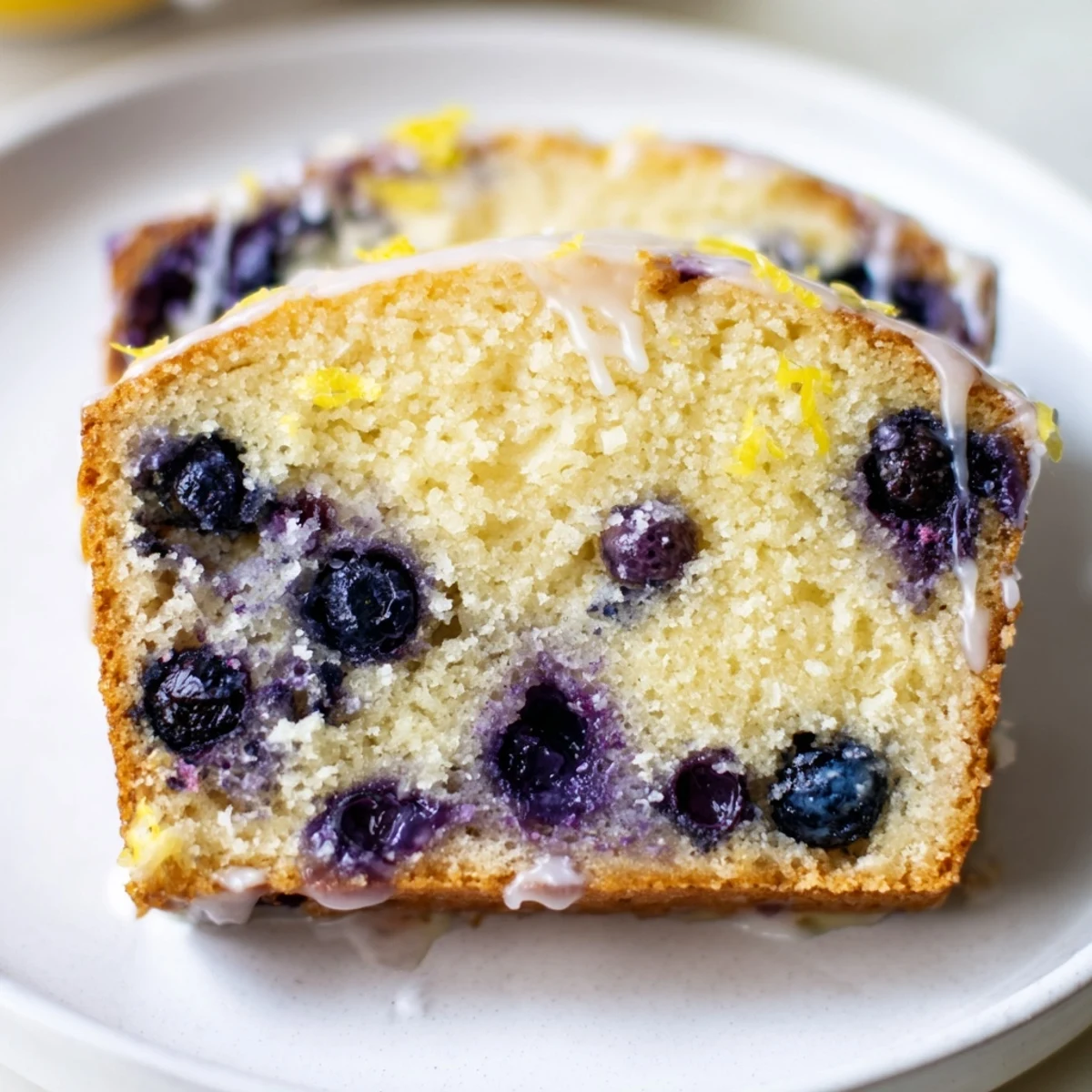 Golden-crusted Lemon Blueberry Yogurt Loaf, perfect for a breakfast treat or delightful snack.
