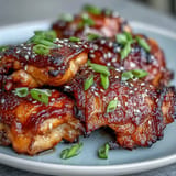 Tender, sticky soy glazed chicken thighs ready for a delicious family dinner.
