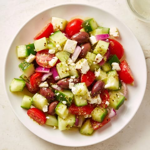This vibrant Fresh Mediterranean Salad with chickpeas and olives is bursting with flavors and textures for a light meal.