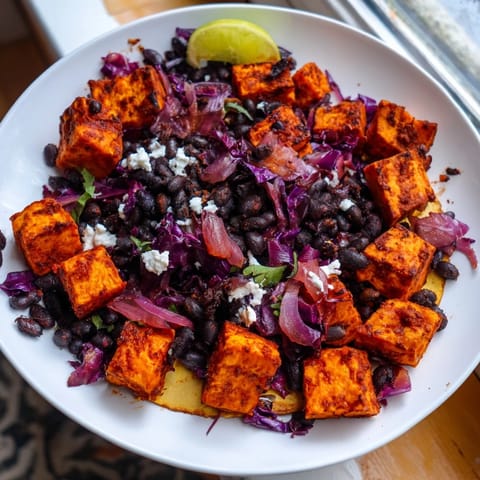 Golden roasted sweet potatoes and black beans star in these flavorful, easy Quick Sweet Potato Tacos.