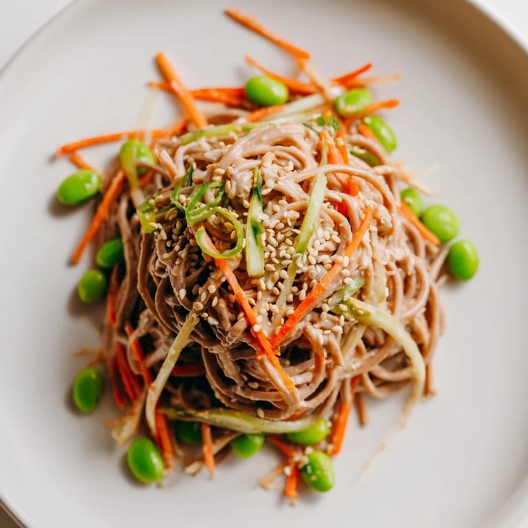 Tempting Asian Sesame Noodle Salad, a cold and flavorful dish, perfect for a light vegetarian meal.
